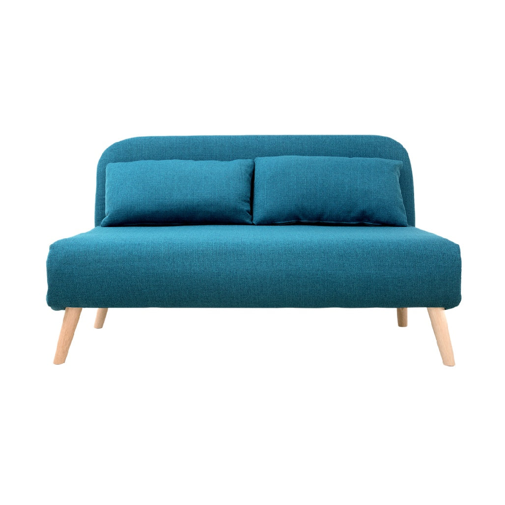 Canapé convertible en tissu bleu avec coussins